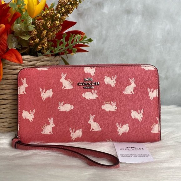 Coach Handbags - COACH LARGE PHONE WALLET WITH BUNNY SCRIPT PRINT